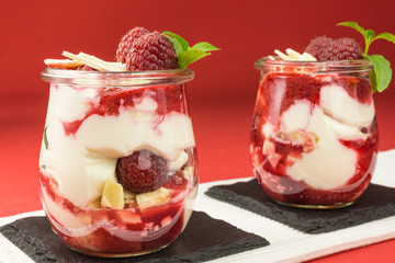 layered dessert with raspberry, cream cheese and white chocolate