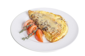 Omelet with cheese and mushrooms.