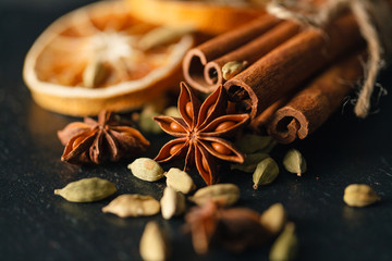 Cinnamon sticks and anise, slate