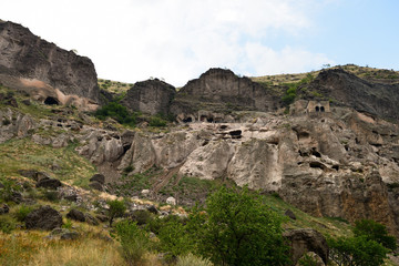 Fototapeta na wymiar Cave monastery coverd in rock, Vardzia, Georgia 