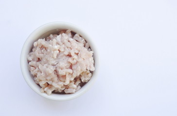 Fototapeta na wymiar raw minced pork ingredient food in cup on white background