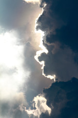 dark cloud and light of sun before rain