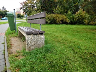 The wooden bench in the city park