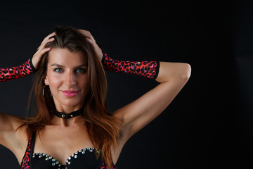 Photo of sexy woman in red underwear, gloves