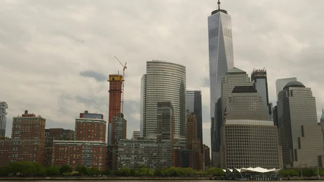 Lower Manhattan and One World Trade Center filmed from Hudson river, New York City.