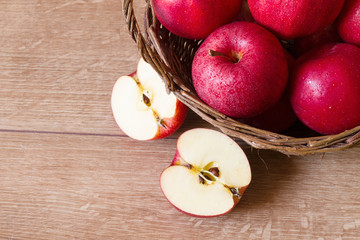 Red apples in a wicker basket