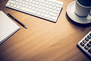 Close Up Computer Keyboard. Empty workspace on wooden table