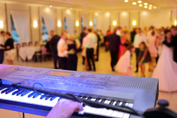 Dancing couples during party or wedding celebration