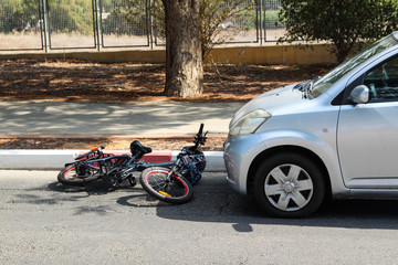 A traffic accident between electric bicycle and car