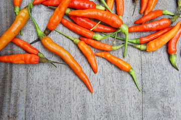 red chili raw on wood table prepare food give a spicy taste.