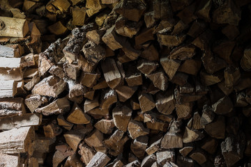 Palenitsa with wood in the village barn. Minimal frame.