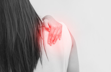 Woman with pain in shoulder. Ache in human body  with red dot, Office syndrome concept.