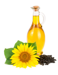 Sunflower oil, seeds and flower isolated on white background