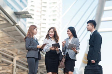 Selective focus Young Businesspeople Corporate Colleagues Talking Concept.