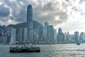 Fototapeta na wymiar Hong Kong City skyline before sunset. View from across Victoria Harbor Hongkong.