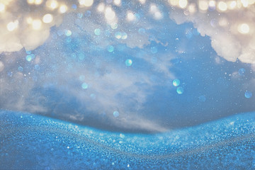 glitter vintage lights background. light blue and silver. de focused