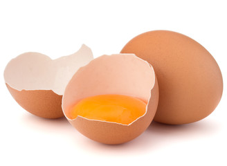 Obraz premium Broken egg in eggshell half and raw egg isolated on white background cutout