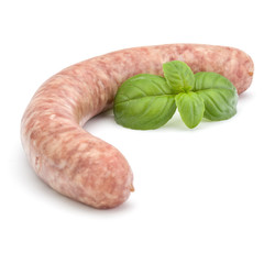 Raw sausage with basil leaf isolated on white background