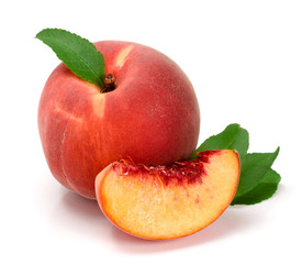 Peach and slice with a green leaf isolated on white background