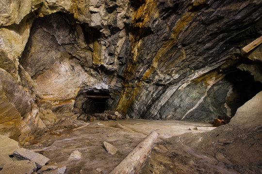 Underground abandoned ore mine shaft tunnel gallery with amazing subsurface rock roach