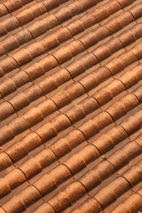 background with roof tile texture. orange bright background with vignette.