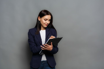 Business woman checking schedule at work