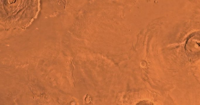 Very high altitude aerial flyover of Mars' western Tharsis region. No HUD. Clip is reversible and can be rotated 180 degrees. Data: NASA/JPL/USGS