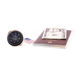 Preparation for traveling concept, black compass and plan ticket, money on passport on white background