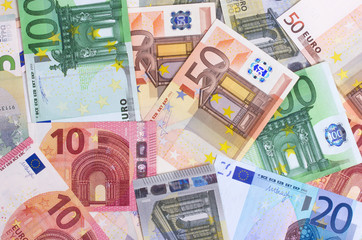 euro money of different denominations abstract background.