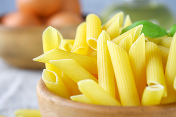 Penne rigate. Macaroni in the form of feathers. mostaccioli pasta