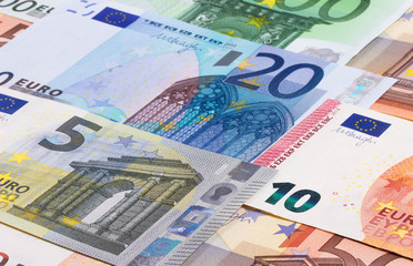 euro money of different denominations abstract background.