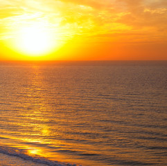 Bright sunrise over ocean