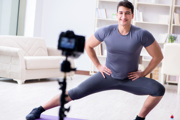 Fototapeta premium Sports and health blogger recording video in sport concept