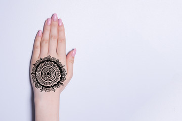 hand with mandala pattern tattoo henna mehendi