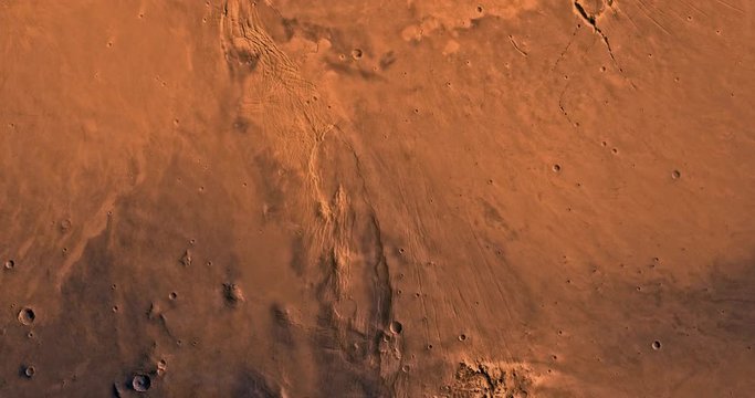 Very high altitude aerial flyover of Mars' eastern Phoenicis region. No HUD. Clip is reversible and can be rotated 180 degrees. Data: NASA/JPL/USGS