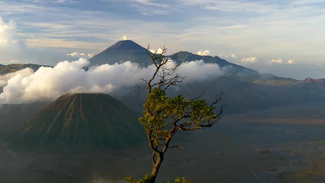 Pannig view of Bromo volcano (Gunung Bromo) at sunrise. UHD, 4K
