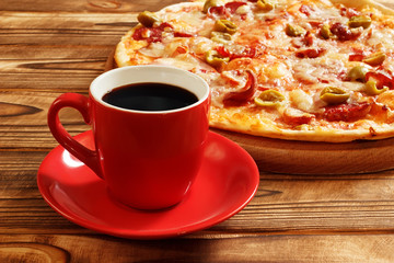 Cup of coffee with pizza