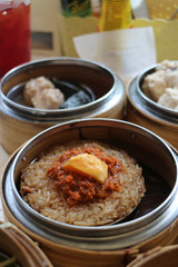 Dim sum sticky rice or rice dumpling in steamer basket
