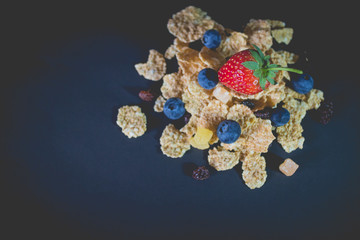 whole grain cereal flakes which mixed berry fruit and raisins