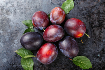 ripe plums are scattered