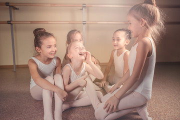 Kid in dance class. Child girl is studying ballet