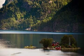 Small house located on a fjord island