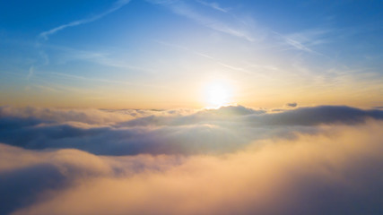 Beautiful sunset above clouds