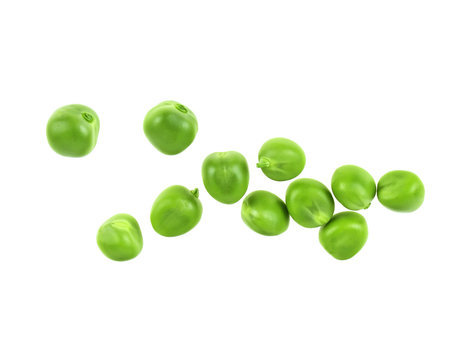 Fresh green peas on a white background, top view