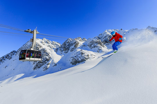 Skiing with amazing view of swiss famous mountains in beautiful winter snow  Mt Fort. The matterhorn and the Dent d'Herens. In the foreground the Grand Desert glacier.