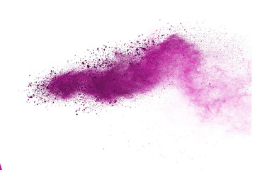 Splash of colorful powder over white background.
