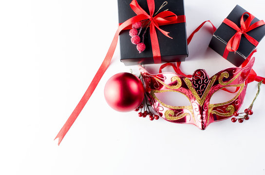 Black christmas  gift  box with red ribbon and nask