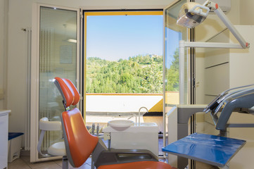 Modern dental practice. Dental chair and other accessories used by dentists