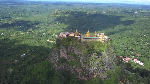 Aerial view from the drone on the Mount Popa,home of Nat the Burmese mythology ghost this place is the old volcano in Bagan, Myanmar