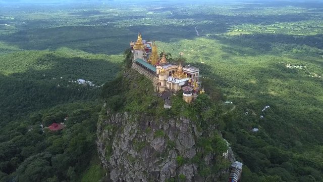 Aerial view from the drone on the Mount Popa,home of Nat the Burmese mythology ghost this place is the old volcano in Bagan, Myanmar